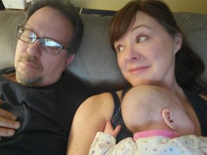 Photo w sleeping husband & our goddaughter.